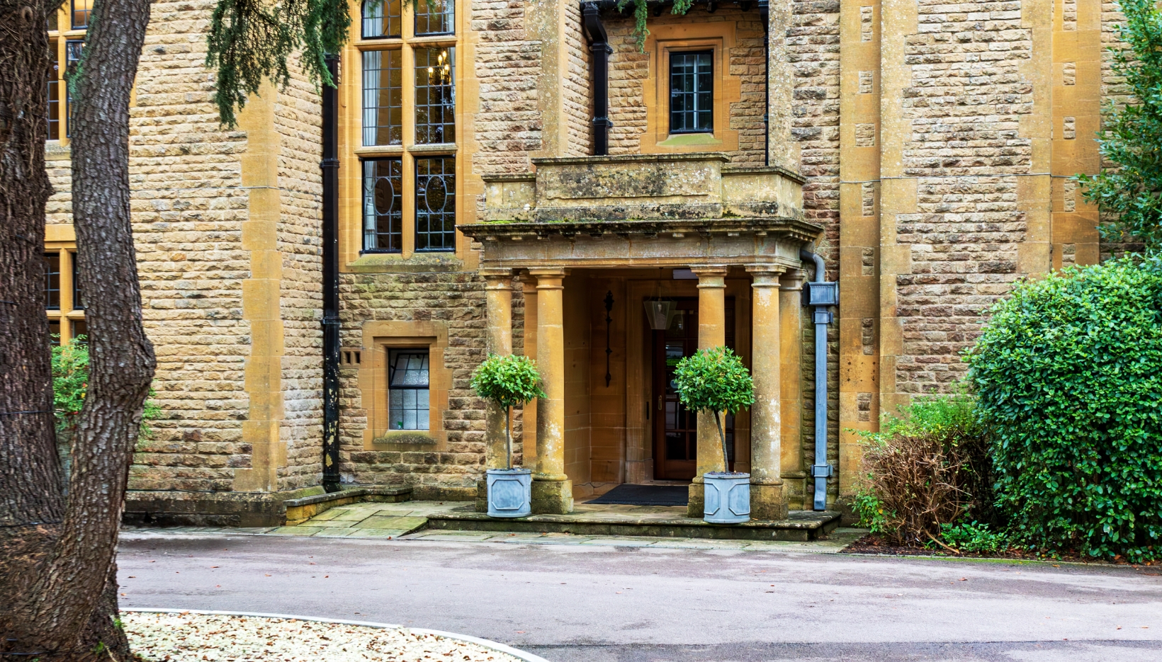 The front pillared entrance to the House at Newlands Care Home in Stow on the Wold in the Cotswolds